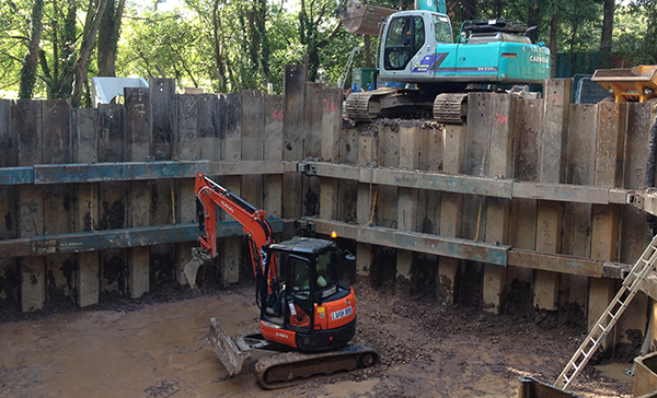 Sheet piling with vibratory hammers