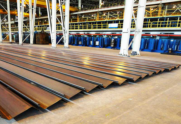 Stability of Breakwater Foundation Reinforced with Steel Sheet Piles under Dynamic Loading